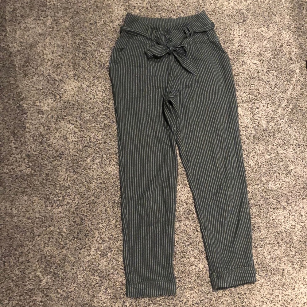 Green and white striped pants